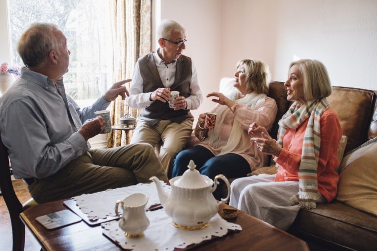 old people sitting in the living room