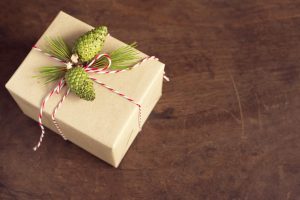 handcraft gift boxes gift box with pinecone and pine branch over wooden background
